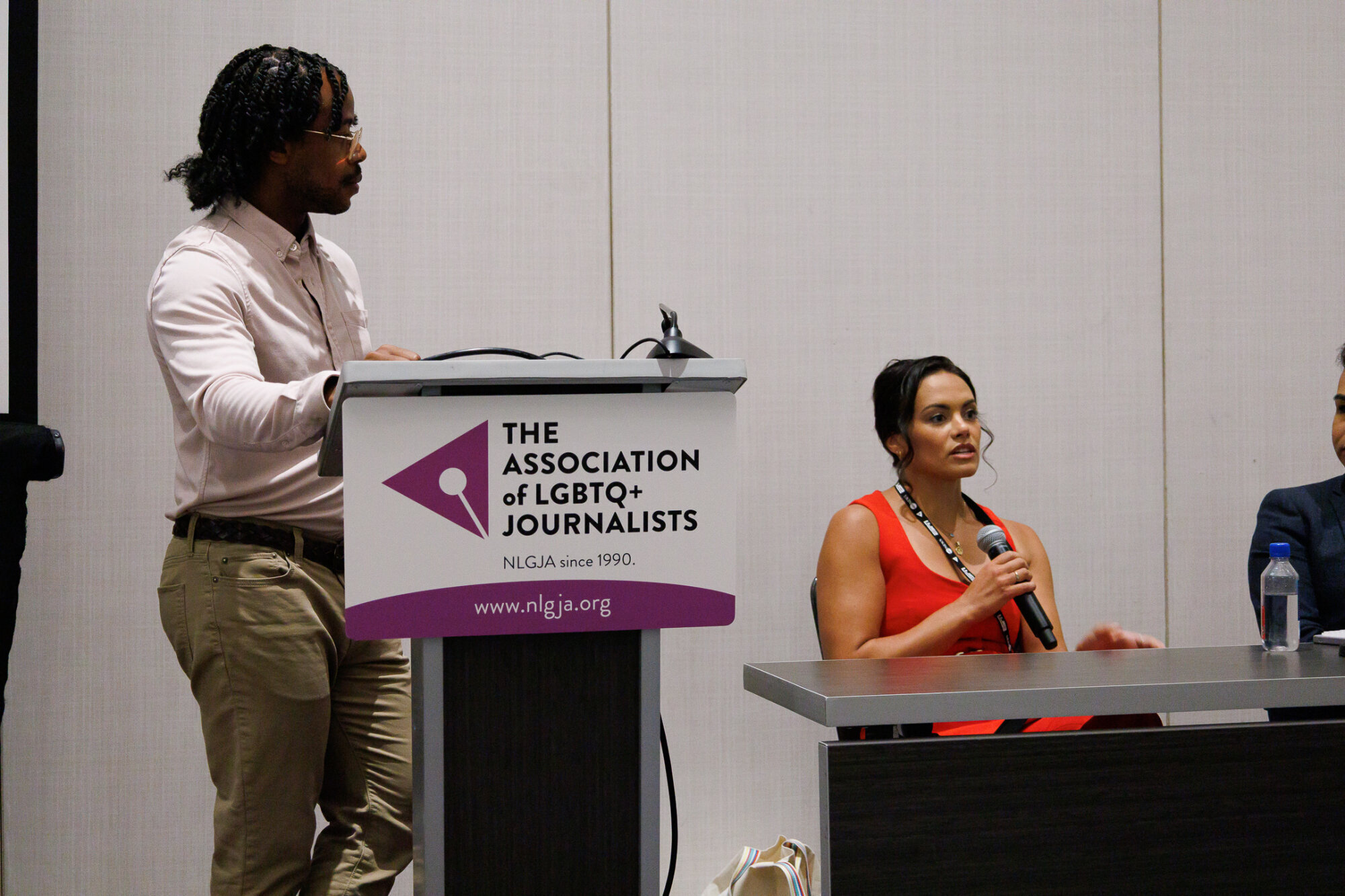 Taylor Bruck speaks on a panel at the convention.
