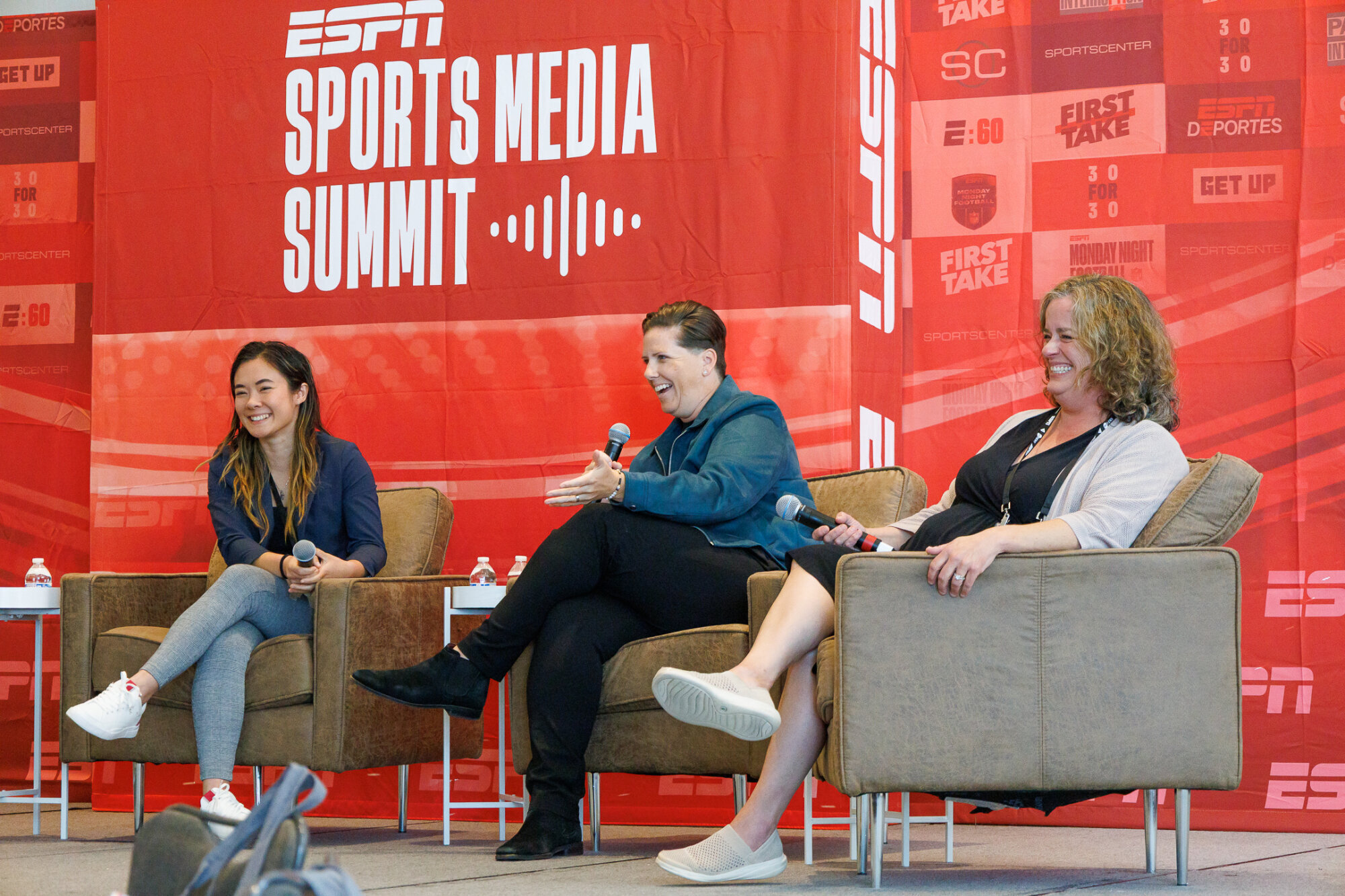Rachel Pearson speaks on stage for an ESPN panel.