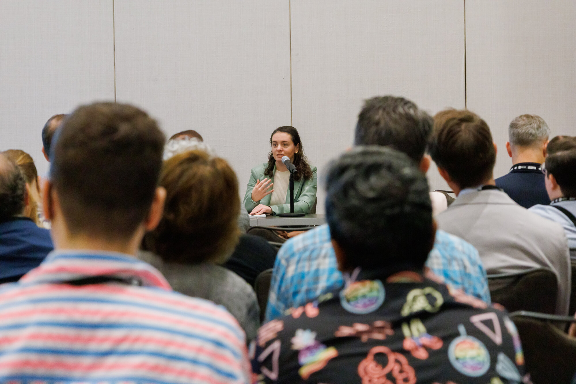 Hannah Schoenbaum speaks to a full room during her panel.