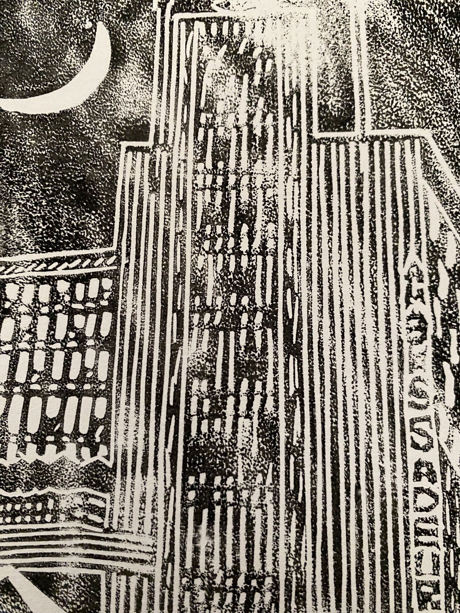 Close up of a linocut print of a hotel in Nairobi