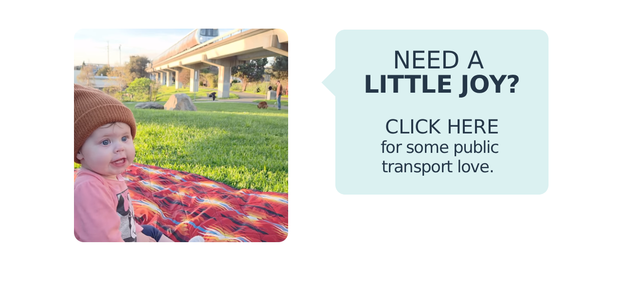 A photo of a toddler watching an elevated train, along with the text: "Need a little joy? Click here for some public transport love."
